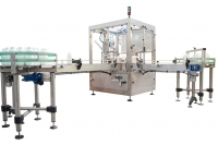 Riempitrice rotativa ad intermittenza con tappatore